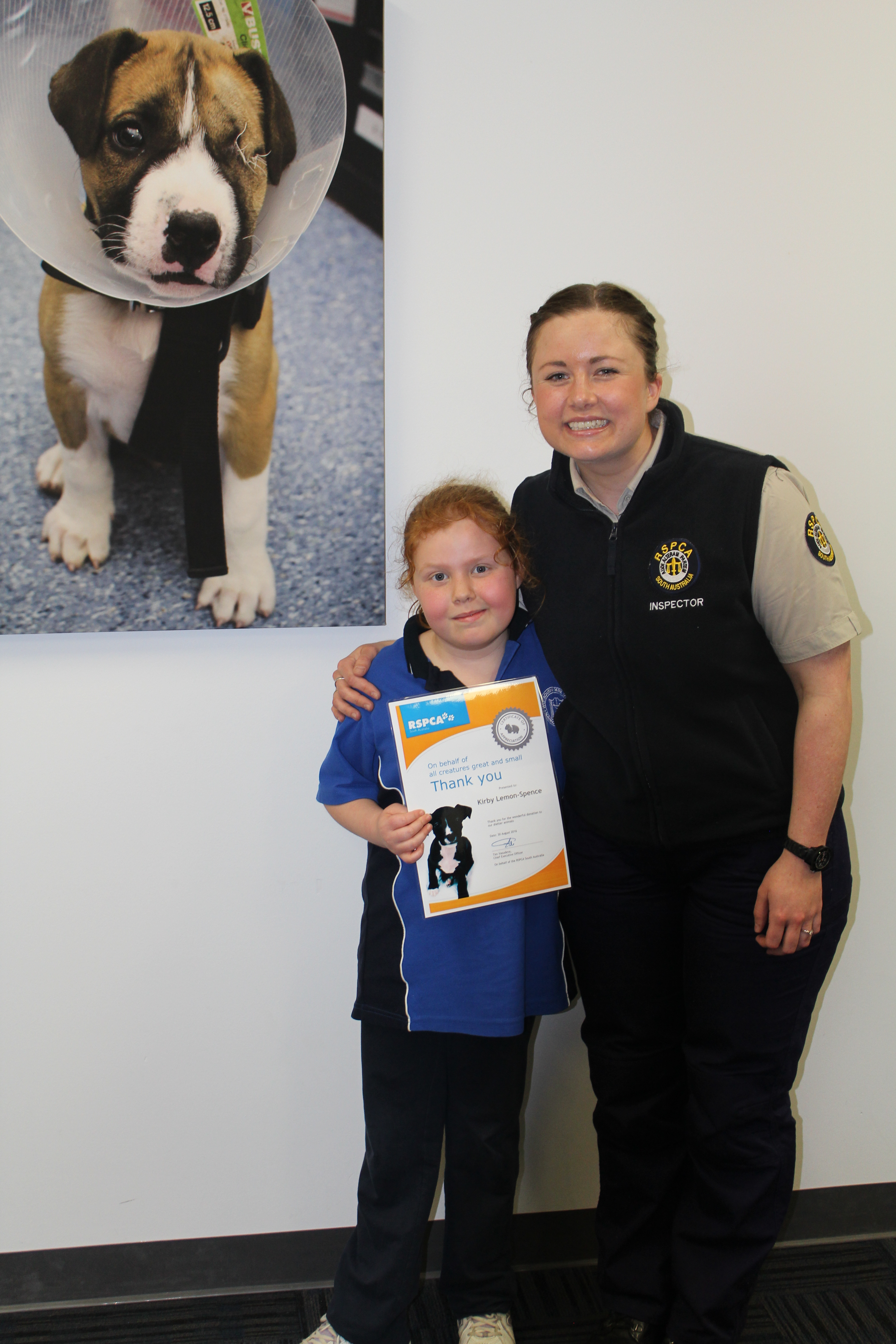 Kirby with RSPCA South Australia Inspector Emily
